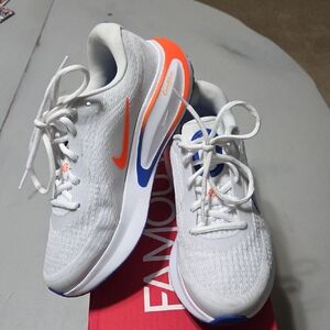 Nike White Sneakers with Orange and Blue Accents